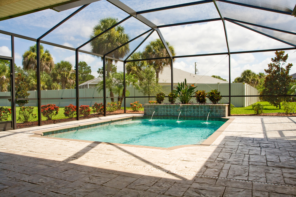 Pool with screen enclosure